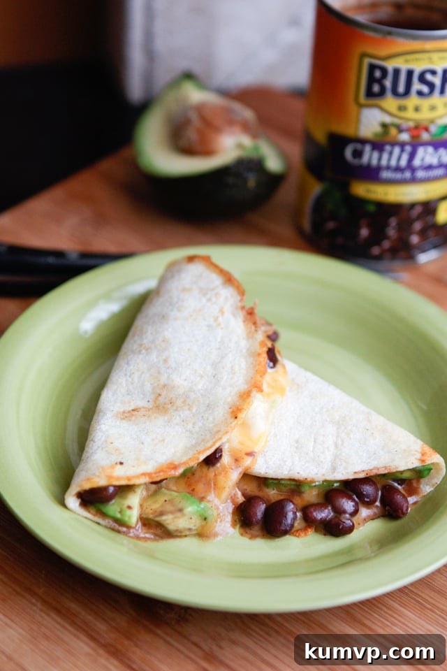 Delicious Black Chili Bean and Avocado Quesadillas, ready to serve for a quick meal or snack.