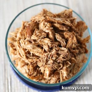 Make a weekly batch of this Slow Cooker Shredded Barbecue Chicken recipe - so many ways to use it in meals!