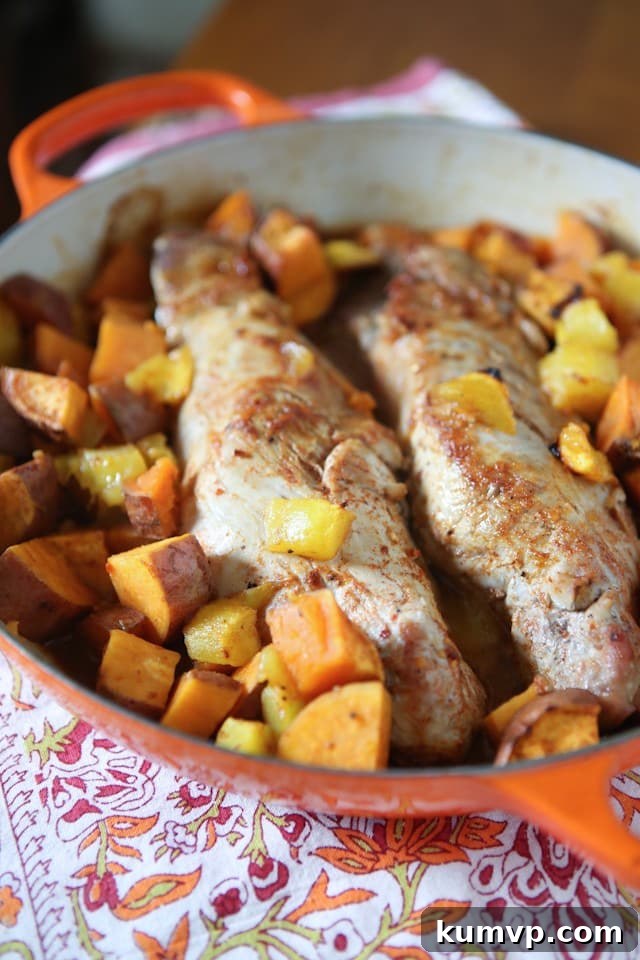 Both sweet and savory, this Maple Mustard Roasted Pork Tenderloin with Sweet Potatoes and Mango is a wonderful healthy meal to serve your family. Maple Mustard Roasted Pork Tenderloin with Sweet Potatoes and Mango on a plate