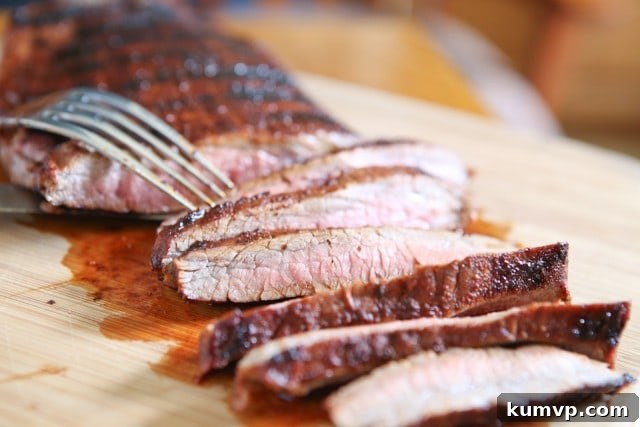 Grilled Flank Steak seasoned with a flavorful blend of brown sugar, chili powder, smoked paprika & cinnamon - fire up your grill for this one this weekend! Juicy Grilled Flank Steak prepared with an aromatic spice blend