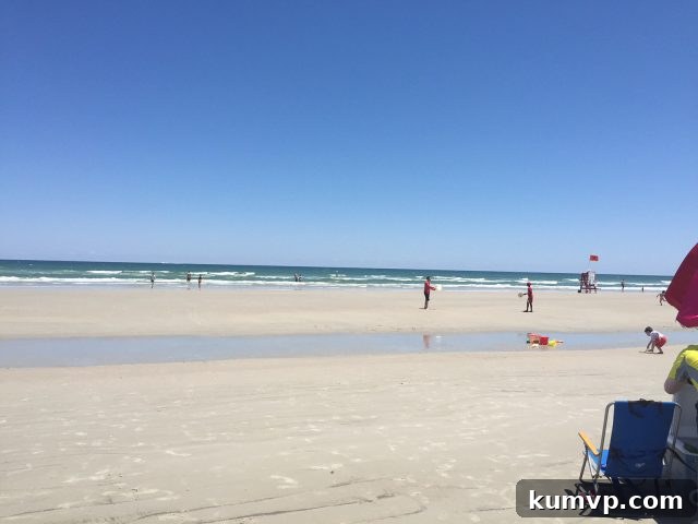 A serene image of New Smyrna Beach, FL, capturing the essence of summer relaxation and coastal beauty.